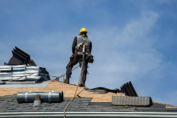 Professional Roof Replacement technician working in Acton, ME